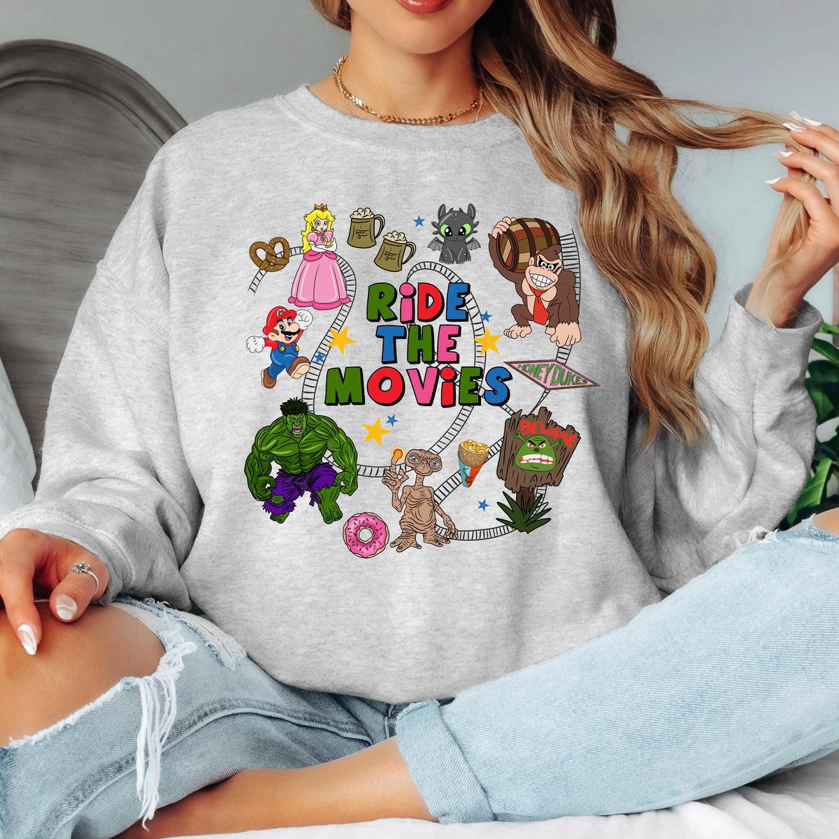 UNIVERSAL/EPIC RIDE THE MOVIES SWEATSHIRT