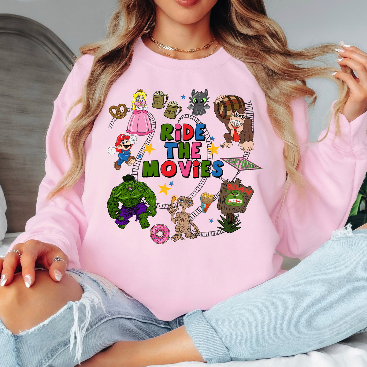 UNIVERSAL/EPIC RIDE THE MOVIES SWEATSHIRT